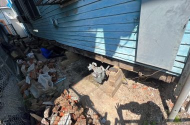 A flood-damaged house in need of foundation repair.