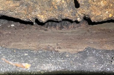 A hole in the ground in need of foundation repair.