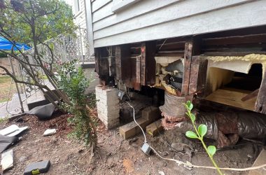 A storm-damaged house requiring foundation repair.