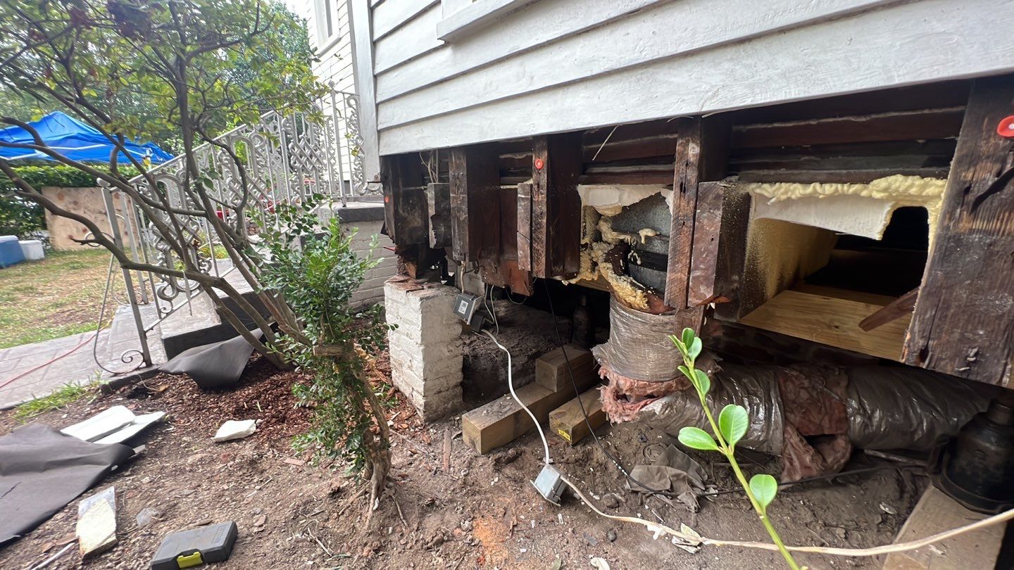 A storm-damaged house requiring foundation repair.