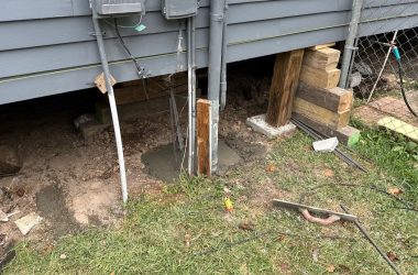 A house with a foundation that is being worked on.