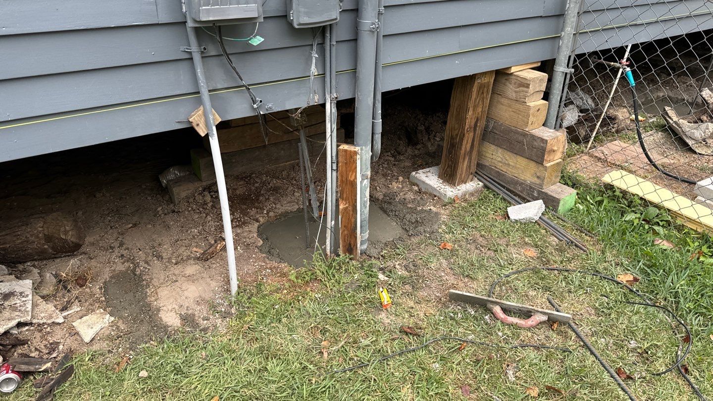 A house with a foundation that is being worked on.